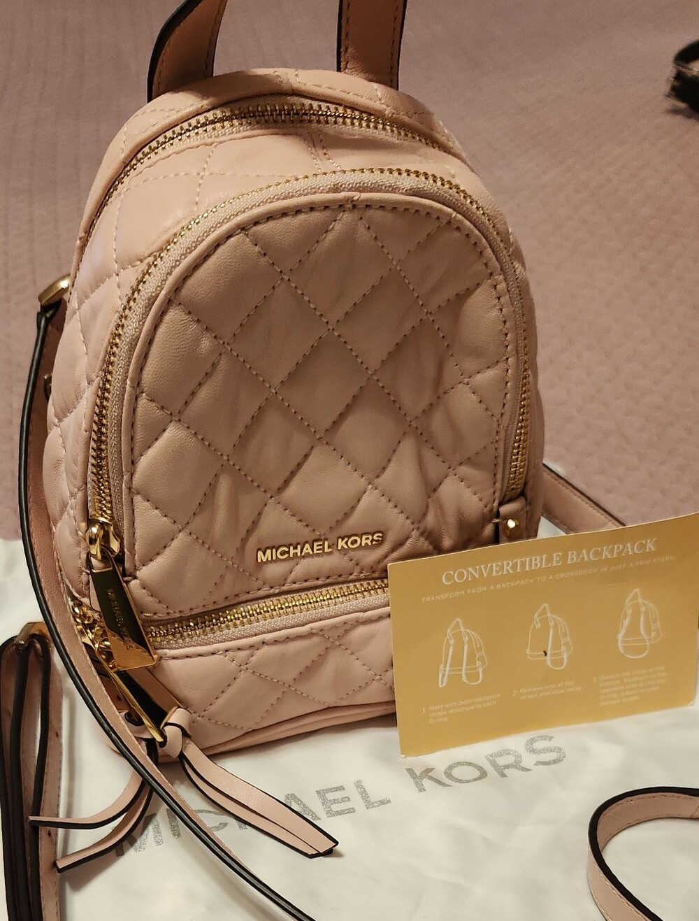 Michael Kors Quilted Convertible Mini Backpack, Crossbody Pale Pink Gold Zipper.